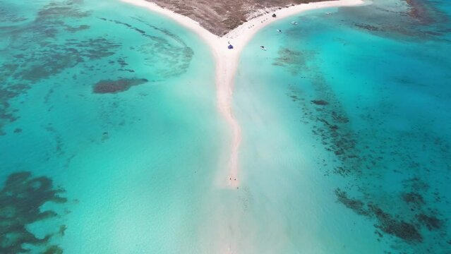 The clear turquoise waters and sandy split of los roques archipelago in venezuela, aerial view
