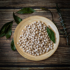 
Raw chickpeas in a bowl overhead view
