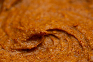 Baby food, vegetable puree close-up. Apple-carrot puree chopped in a blender. Background texture of food for newborn children.