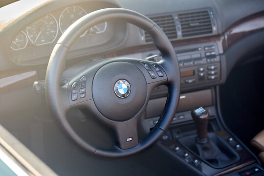 Berlin, Germany - August 20, 2022: Car Detail Shot of BMW E28 M5 1984-1988 M5 interior view. Classic BMW car interior with steering wheel dashboard manual transmission shift lever and controls.