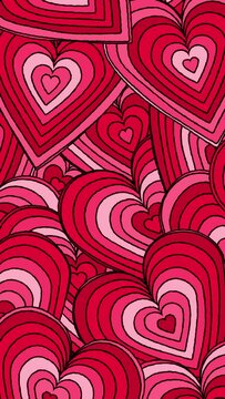 Looped cartoon abstract background of overlapping concentric pink and red hearts in vertical composition format.