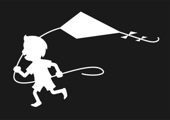 A child launches a kite on a dark background.