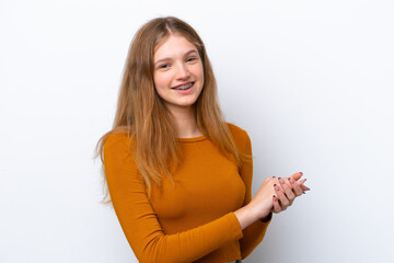 Teenager Russian girl isolated on white background applauding