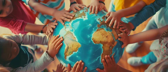 Foto op Canvas Group children holding planet earth and forming a circle around a globe over nature background. World peace concept © Ton Photographer4289