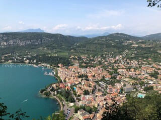 Naklejka premium landscape, lake, view, bay, tree, coastline, arriving, sky, coast, nature, panorama, expanse, Italy, Lake Garda, Garda, rocca di garda, cycle trip, bikepacking, freedom, limitless