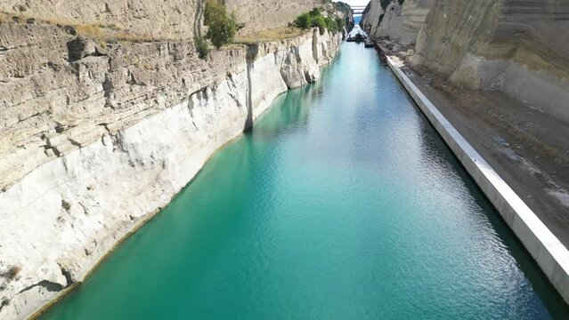 Corinth Canal Connecting The Gulf Of Corinth With Saronic Gulf In Aegean Sea, Greece - aerial drone shot