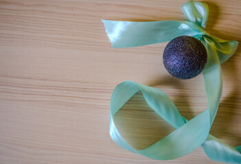 Christmas arrangement hanging blue decorations and silk twisted ribbons isolated