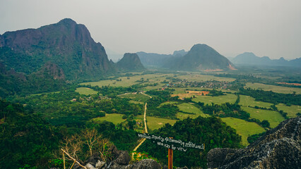 Beautiful Forest landscape of Sunset panoramic view from Nam Xay viewpoint in Vang Vieng at sunset, Laos