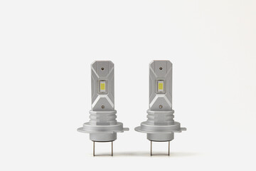 Modern LED lamps for a car on a white background. Lamp base H7. Copy space