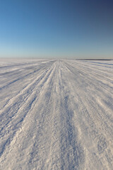 a slippery and dangerous road covered with snow and ice