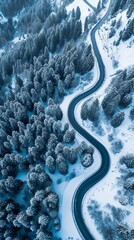 Aerial view of the winding Snake Road in winter in the Dolomite Alps of Italy