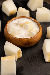 yogurt with melon flavor and ripe and delicious melon close-up