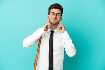 Business man over isolated background smiling with a happy and pleasant expression