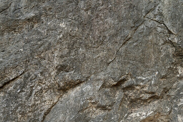 Stone floor has a unique rough surface and light color. For background and textured.