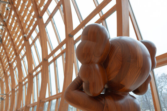Art Gallery of Ontario - rear view of a contemporary wooden figure and wooden structure of Frank Gehry's Galleria Italia - Toronto, Canada