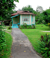 Typical traditional Malay wooden house on stilts in the village of Hulu Langat, Malaysia