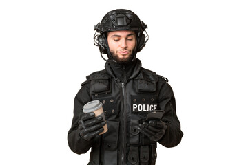 SWAT over isolated chroma key background holding coffee to take away and a mobile