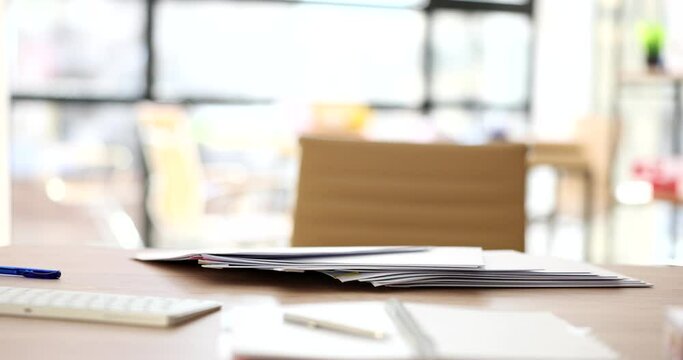 Aggressive man feels stress at work and throws documents on table. Crazy impulsive crazy manager throwing paperwork in anger