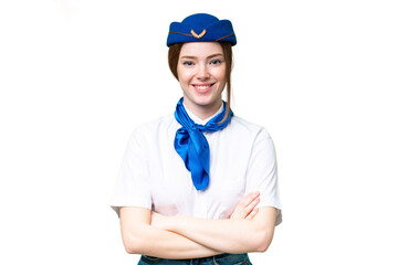 Airplane stewardess over isolated chroma key background keeping the arms crossed in frontal position