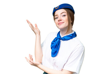 Airplane stewardess over isolated chroma key background extending hands to the side for inviting to come