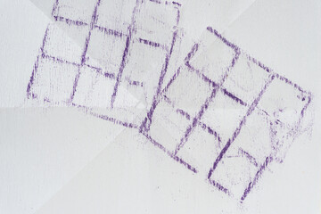 two purple oil pastel grids (rubbings) on paper with crease lines