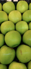 MAKASSAR, INDONESIA Asia, February 2 2024 neatly arranged green apples for sale in a shop