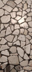 MAKASSAR, INDONESIA Asia, January 15 2024 background of stone fragments stuck to the floor