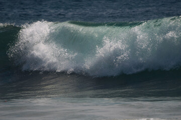 wave breaking on the beach