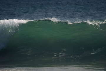 wave breaking on the beach