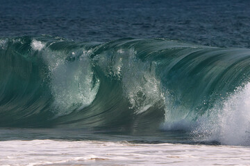 wave breaking on the beach