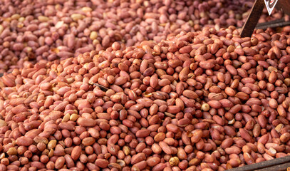 Freshly roasted peanuts sold openly in the market,