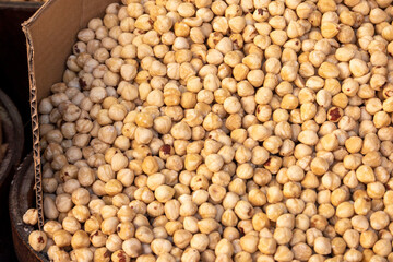 close-up of a large amount of roasted peeled hazelnuts,