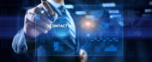 Fototapeta na wymiar Contact us customer communication concept. Businessman pressing button on screen.