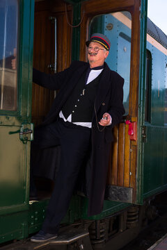 Railway conductor in Steam Train