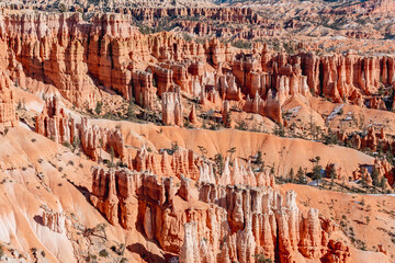 Bryce canyon national park in winter, unique rock formations in utah covered in snow, orange rocks in snow, cold winter in the usa