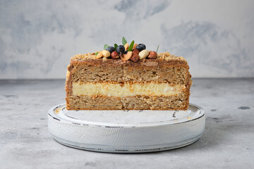 Cake with meringue sponge cake with hazelnuts and butter cream.