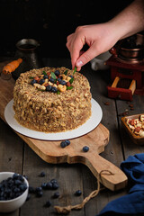 Cake with meringue sponge cake with hazelnuts and butter cream.