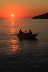 a boat and the sunset