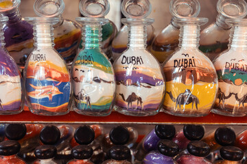 Glass bottle with Dubai title. Dubai souvenirs