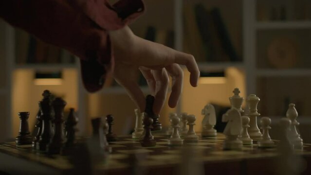 A cinematic shot of a chess move by an experienced player moving the knight piece across the board. In an authentic chess hall, he continues his game, embodying skill and concentration