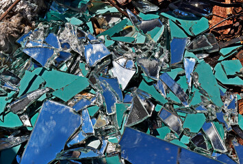 Broken mirror thrown in vacant lot