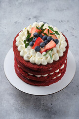 Sponge cake red velvet. Cake with cream cheese cream and raspberry filling.