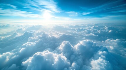 A Stunning View of the Clouds and Blue Sky from Above.