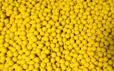 Fishing baits on the conveyor belt in a fishing factory carp fishing