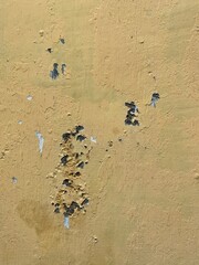 Old wall paint peeling, exterior building.
