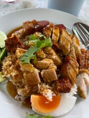 Crispy pork with rice ang boiled egg topping, is called Kao moo krob in Thai, Thai, Chinese dish