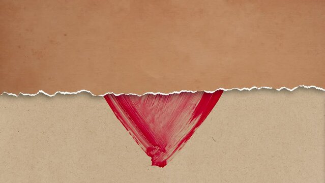 Torn strip of paper revealing a painted heart