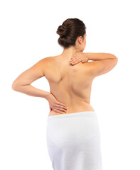Young woman massaging back pain on white background
