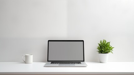 A sleek and modern laptop open on a clean white desk