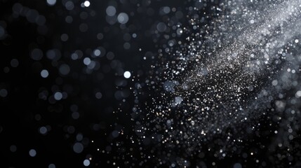 Obraz premium background of small white blurred particles.